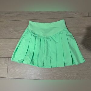 Free people movement swing of things skort size medium lime green NWT